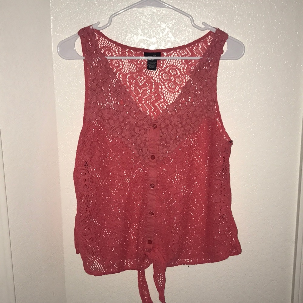 Pink vest like top.